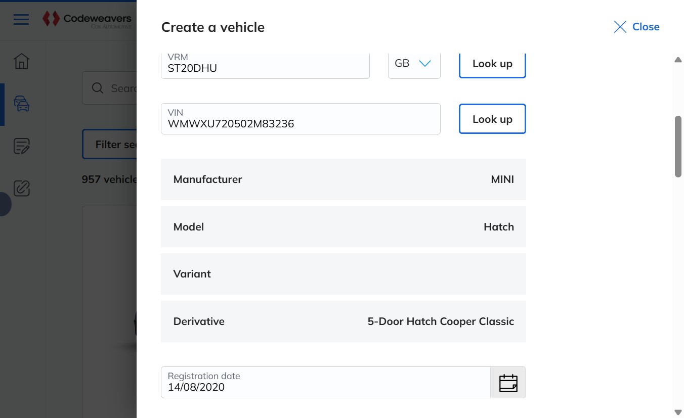 The Create a vehicle panel after a successful VRM lookup, showing manufacturer, model and derivative fields populated